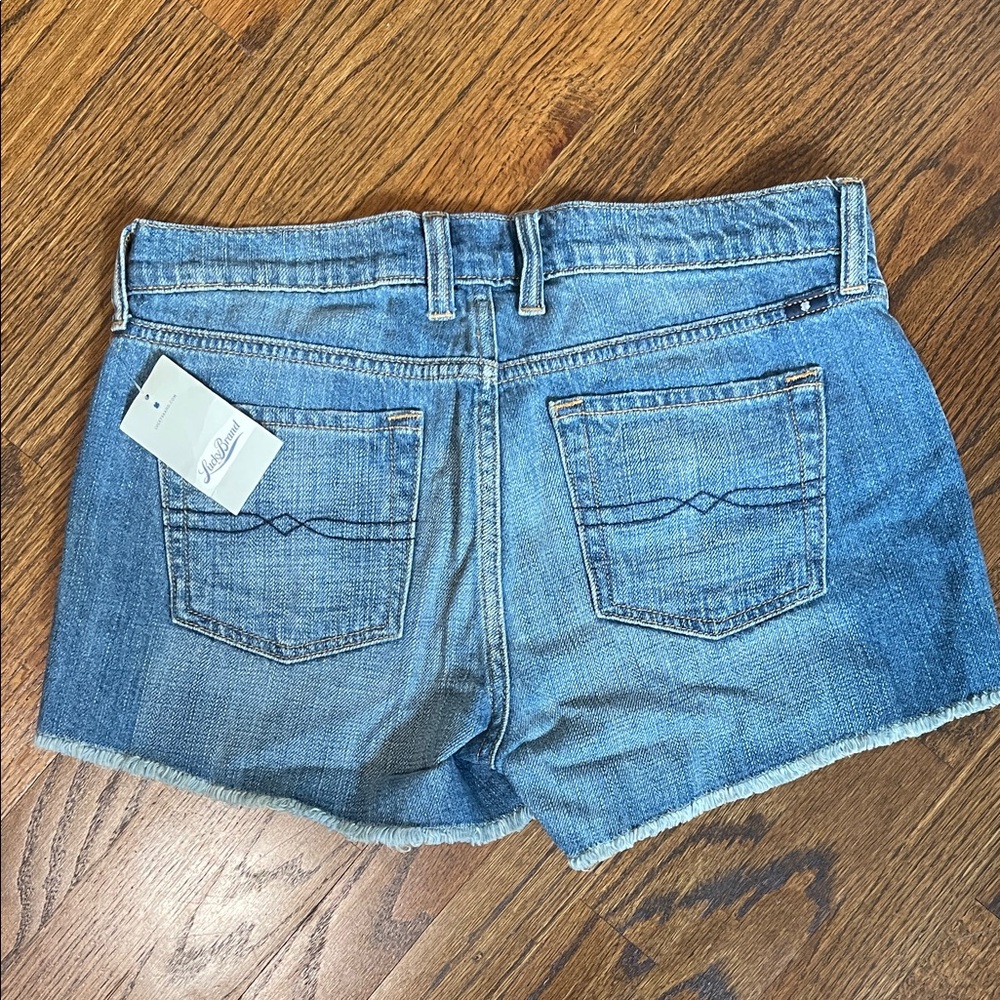 Women’s Light Blue Denim Cutoff Shorts - Picture 2 of 11